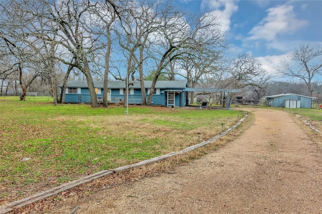 single story home with a front yard