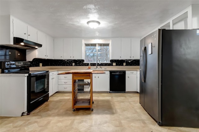 kitchen with sink, white cabinetry, backsplash, black appliances, and a textured ceiling