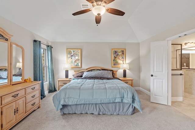 carpeted bedroom with vaulted ceiling and ceiling fan