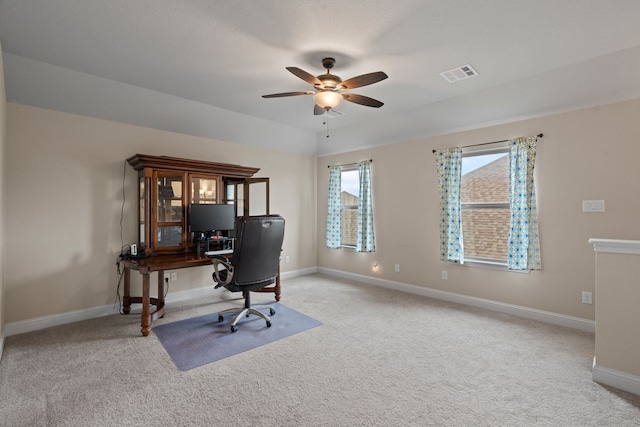 carpeted office with ceiling fan