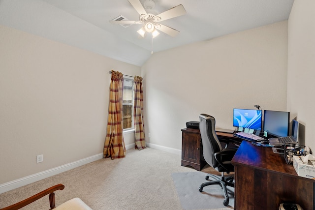 carpeted office featuring lofted ceiling and ceiling fan