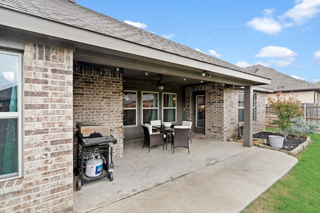 view of patio / terrace featuring a grill and ceiling fan