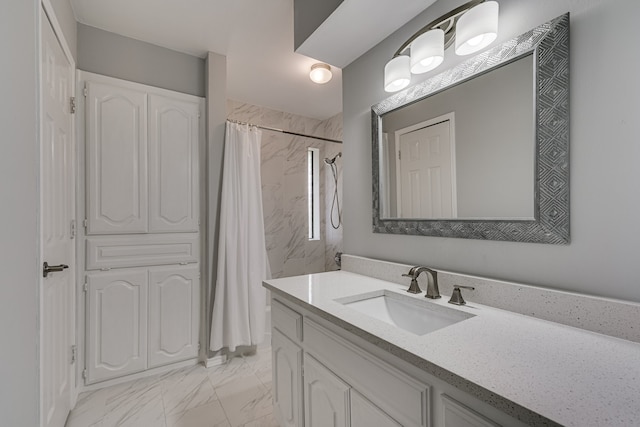 bathroom with a shower with curtain and vanity