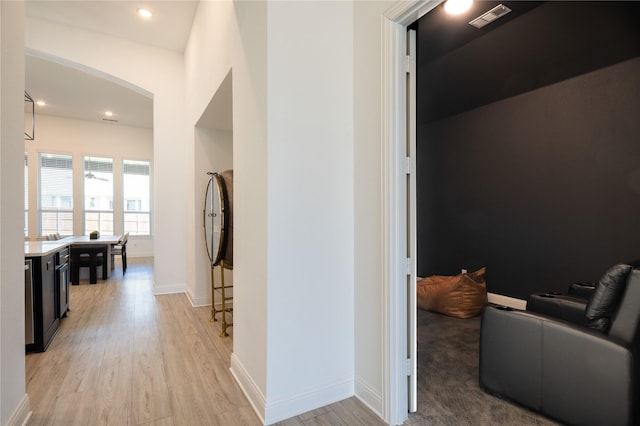 corridor featuring light hardwood / wood-style floors