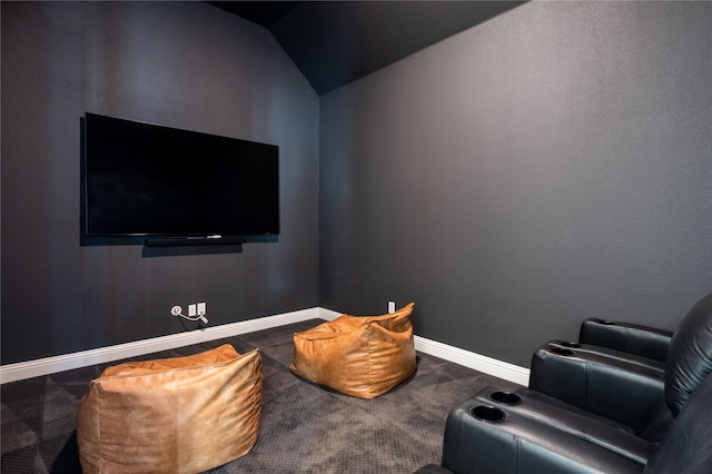 sitting room featuring vaulted ceiling