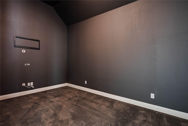 4100 Sandbrock Pkwy, Aubrey, TX 76227 - unfurnished room featuring dark colored carpet, baseboards, and vaulted ceiling