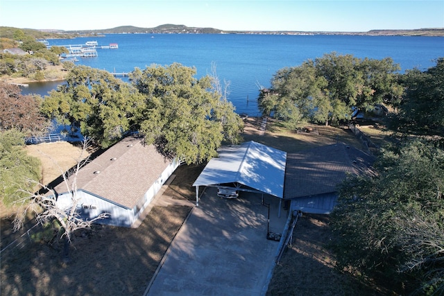 bird's eye view with a water and mountain view