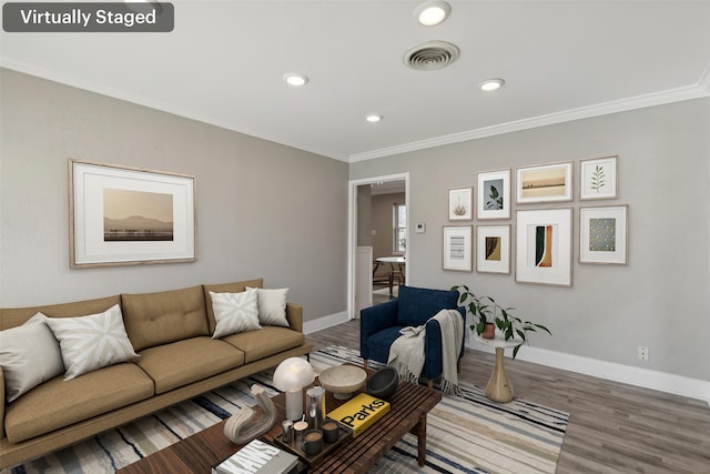 living room featuring ornamental molding and hardwood / wood-style floors