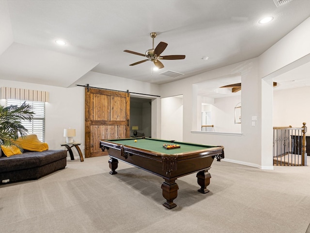 playroom with a barn door, ceiling fan, light colored carpet, and pool table