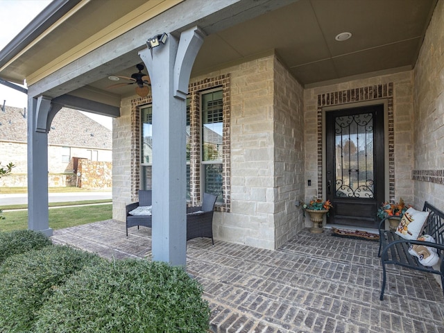 property entrance with ceiling fan