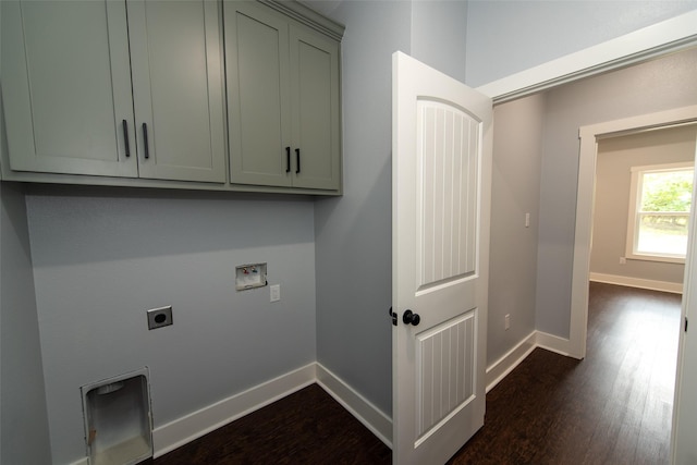 laundry area featuring hookup for an electric dryer, dark hardwood / wood-style floors, cabinets, and washer hookup