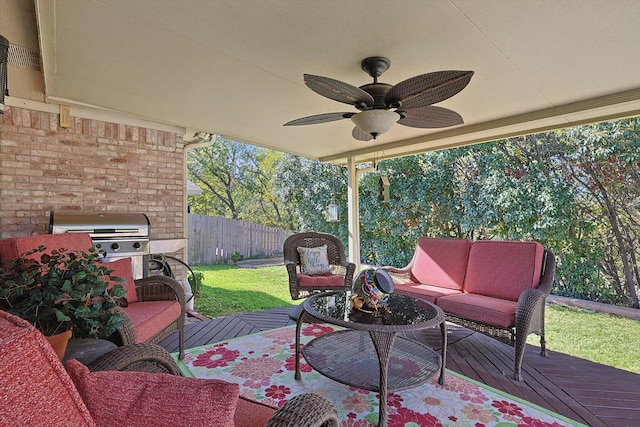 view of patio featuring ceiling fan, a deck, and an outdoor hangout area