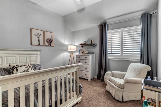 carpeted bedroom with vaulted ceiling and ceiling fan