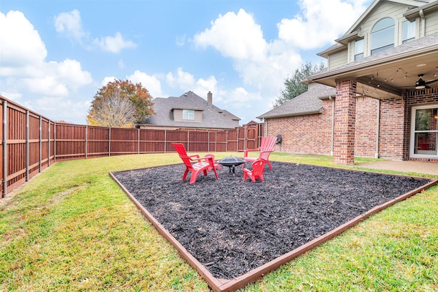 view of yard featuring a fire pit