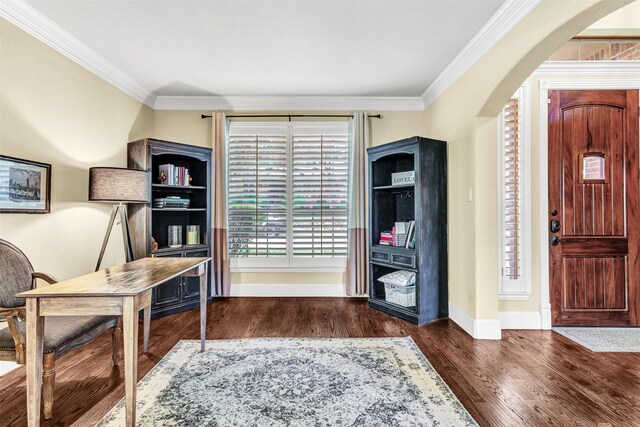 office with dark hardwood / wood-style flooring and crown molding