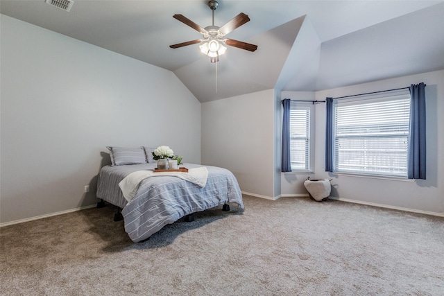 carpeted bedroom featuring ceiling fan and lofted ceiling