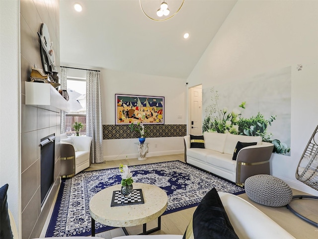 living room featuring high vaulted ceiling