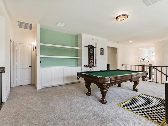 playroom featuring an inviting chandelier and light colored carpet