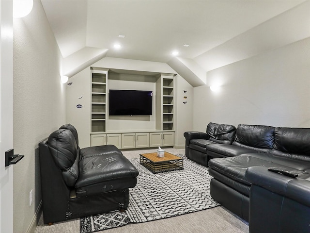 living room with lofted ceiling and light carpet