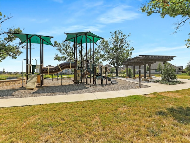 view of play area with a pergola and a yard