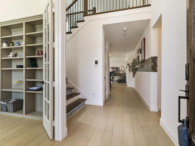 staircase featuring hardwood / wood-style floors