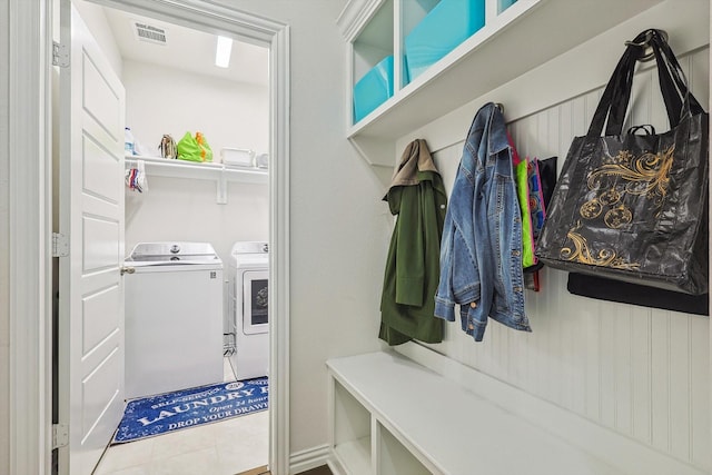 2133 Miramar Dr, Little Elm, TX 75068 - mudroom with independent washer and dryer and tile patterned flooring