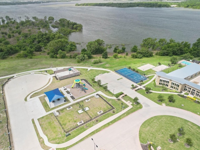 birds eye view of property with a water view