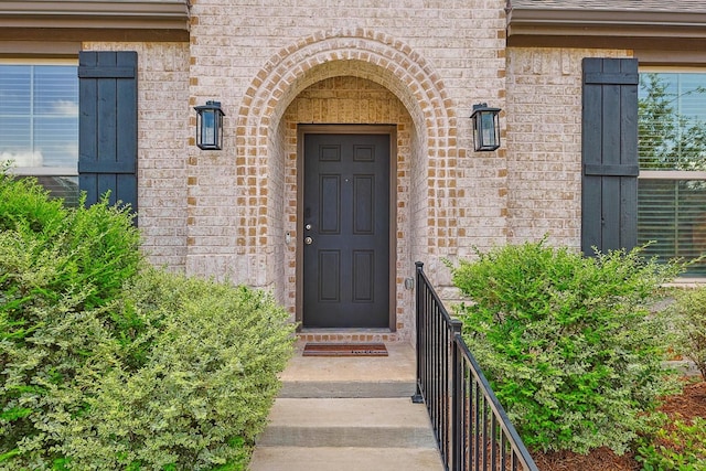 2133 Miramar Dr, Little Elm, TX 75068 - property entrance with brick siding
