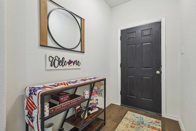 2133 Miramar Dr, Little Elm, TX 75068 - foyer entrance with dark wood finished floors and baseboards