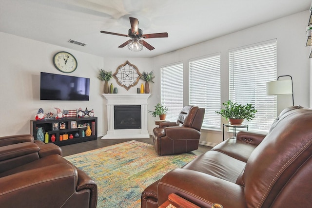 living room featuring ceiling fan