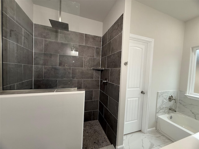 bathroom with shower with separate bathtub