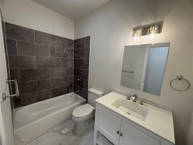 full bathroom featuring vanity, toilet, and tiled shower / bath