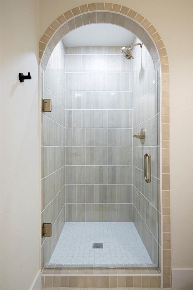 bathroom with an enclosed shower