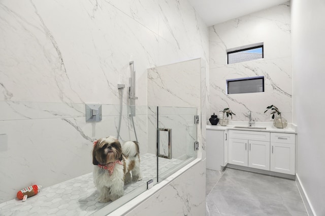 bathroom featuring vanity and walk in shower