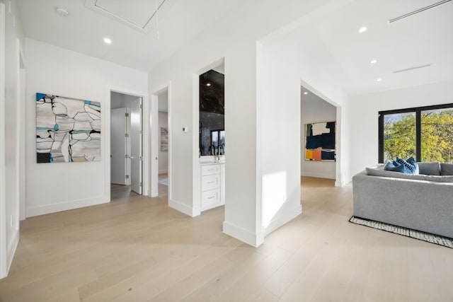 corridor featuring light hardwood / wood-style flooring