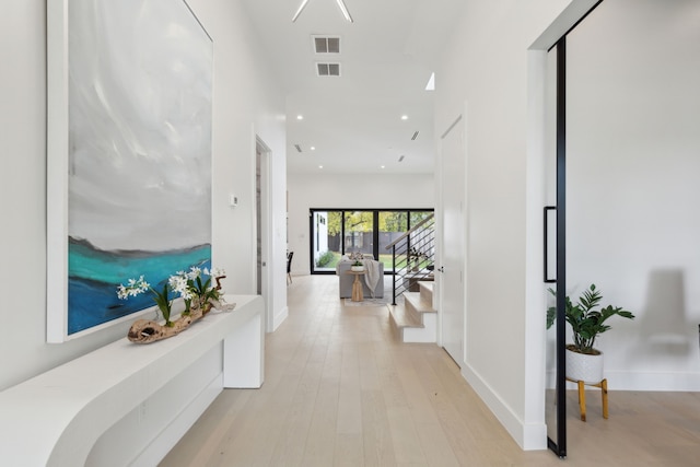 hall featuring light hardwood / wood-style floors