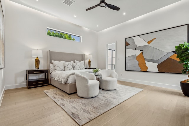 bedroom featuring light wood-type flooring and ceiling fan