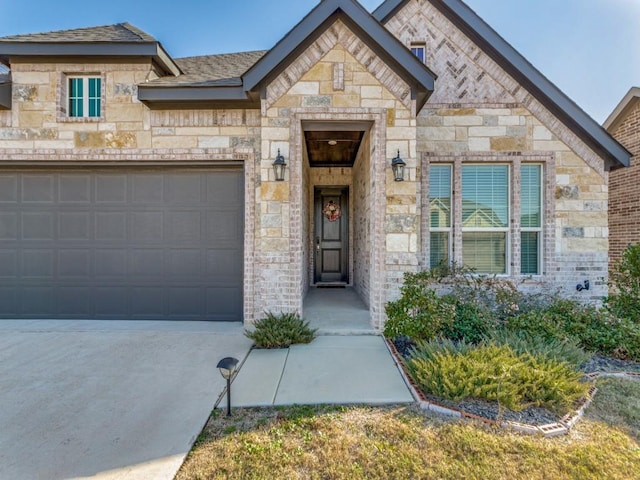 view of front of home with a garage