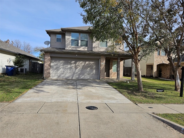 view of front of home with a front lawn, central AC unit, and a garage