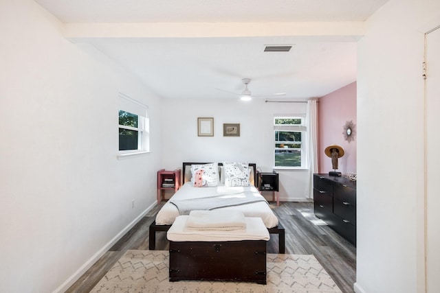 bedroom featuring ceiling fan and dark hardwood / wood-style floors