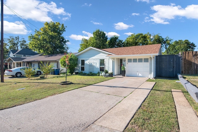 ranch-style house with a front yard and a garage