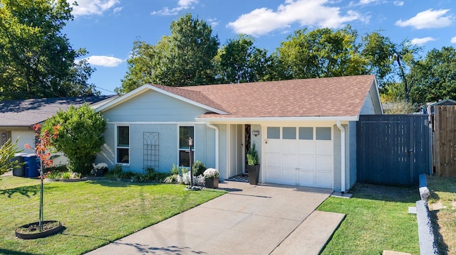 ranch-style house with a garage and a front yard