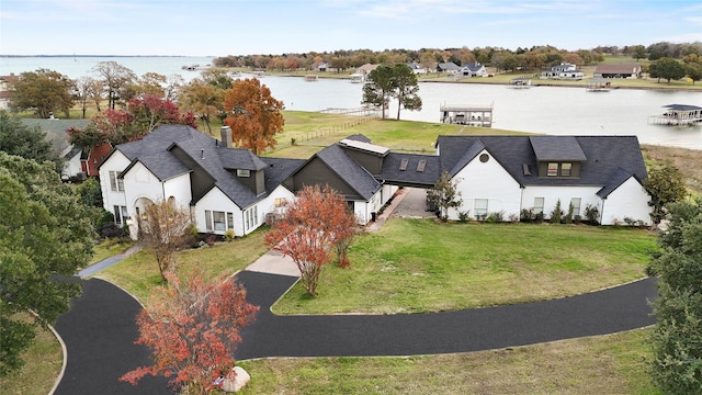 bird's eye view with a water view