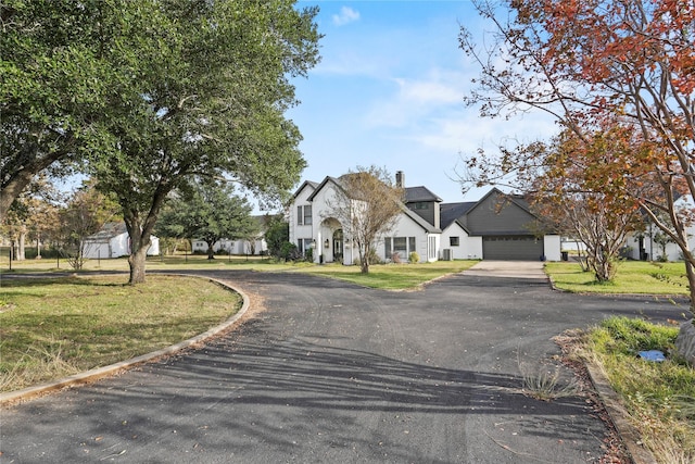 view of front of property with a front lawn