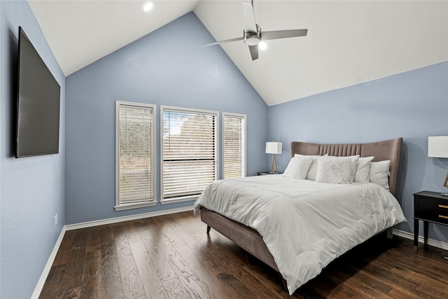 bedroom with high vaulted ceiling, ceiling fan, and dark wood-type flooring