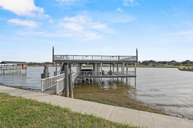 dock area with a water view