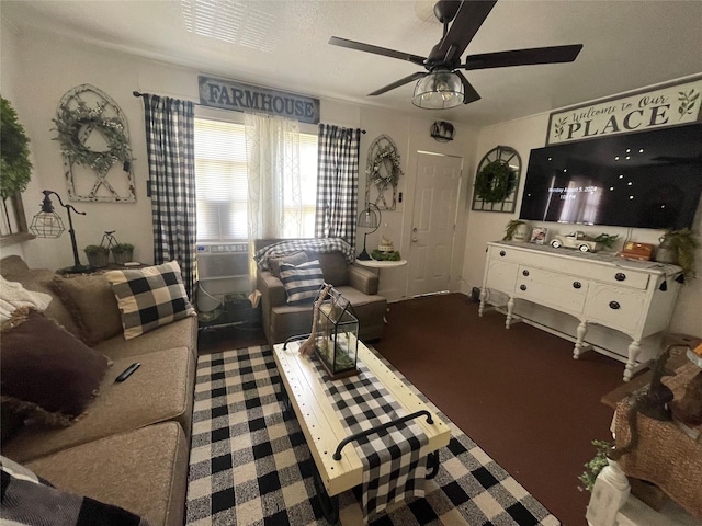 living room featuring carpet and ceiling fan