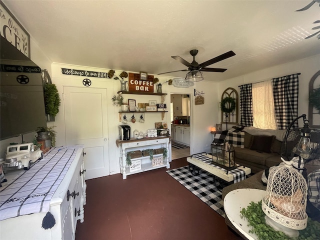 living room with ceiling fan