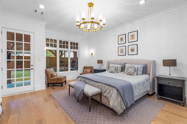 bedroom with ornamental molding, a chandelier, and wood-type flooring