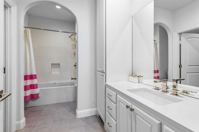 bathroom featuring vanity, tile patterned floors, and shower / bathtub combination with curtain